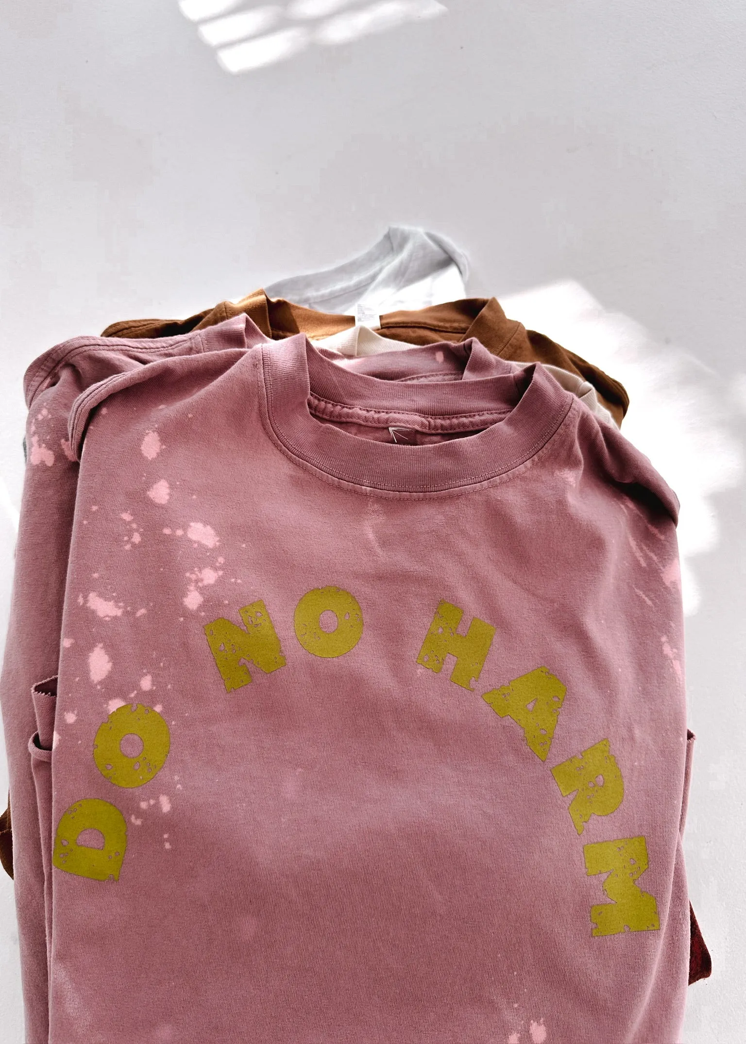 DO NO HARM BLEACHED OUT SIDE SLIT TEE
